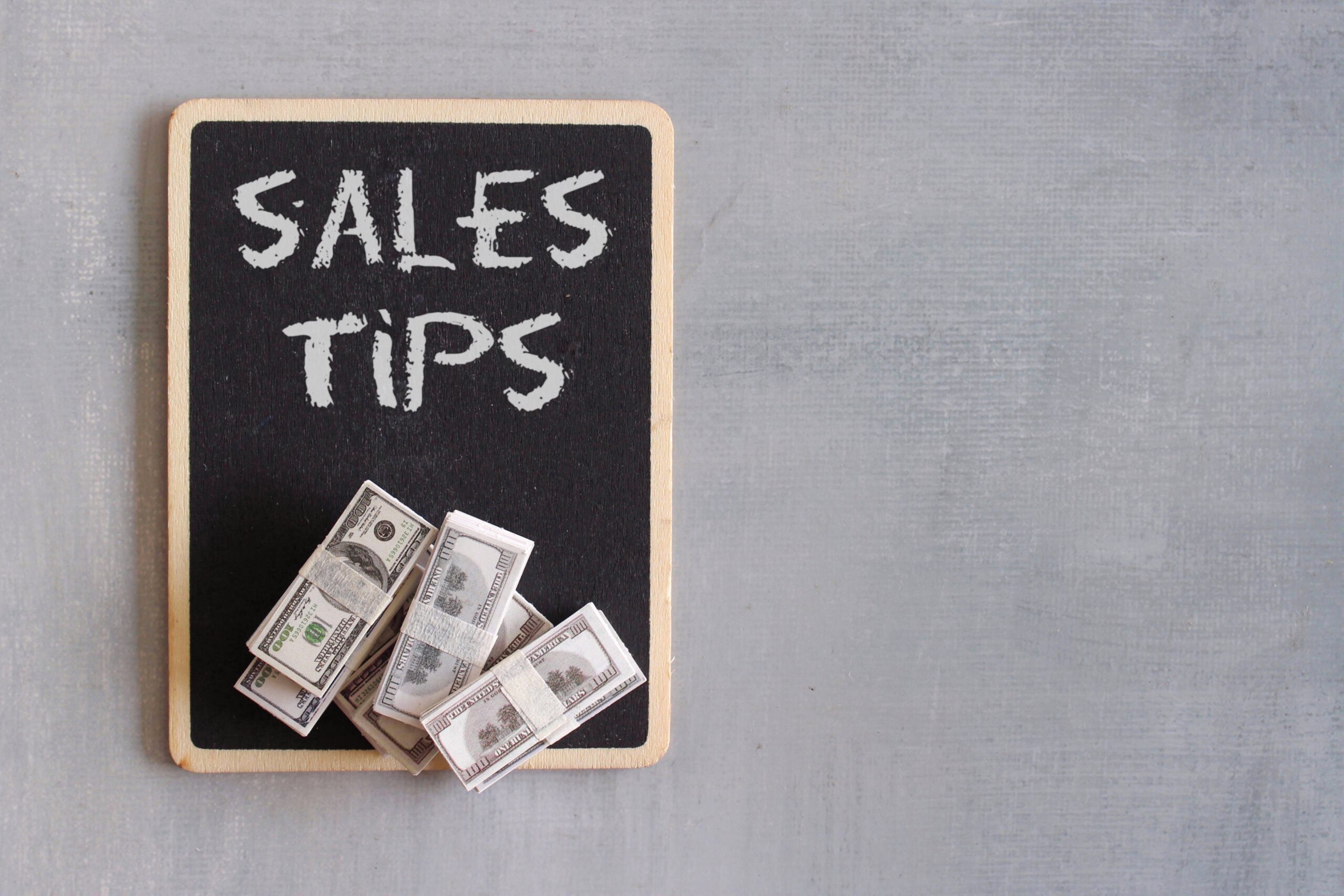 Dollar bills on top of a small blackboard